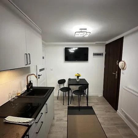 Skwerowa Nest דירה